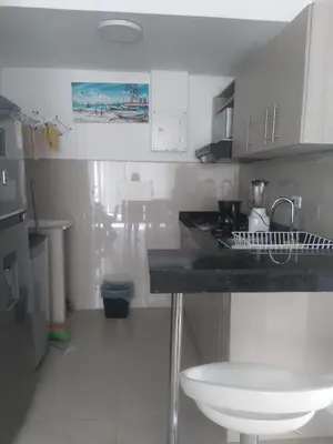 a kitchen with a counter top and a sink at VISTA CARIBE- apartamento piso 25, marbella in Cartagena de Indias