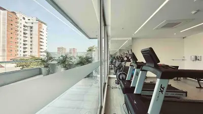 a gym with cardio equipment in a building at Suite 1010 - Ocean View - Distrito90 in Barranquilla