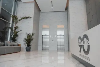 a lobby of a building with a sign that reads electric at Suite 1010 - Ocean View - Distrito90 in Barranquilla