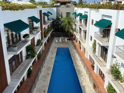 an aerial view of a swimming pool in a building at Incredible 2BR with AC in Ciudad Amurallada in Cartagena de Indias