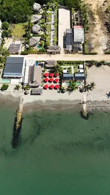 an aerial view of a resort on a beach at Luxury Suite frente de Mar Piscina Restaurante y Bar in San Silvestre