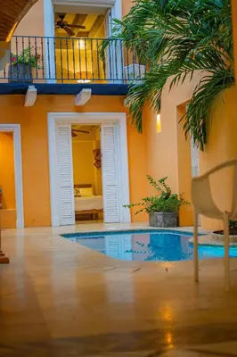 a swimming pool in the middle of a house at Niña Maria pool House Plaza San Diego, Downtown! in Cartagena de Indias