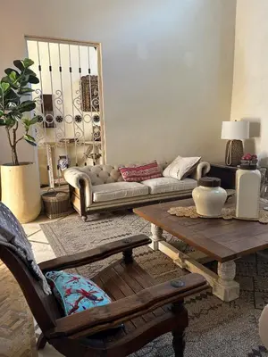 a living room with a couch and a table at Niña Maria pool House Plaza San Diego, Downtown! in Cartagena de Indias