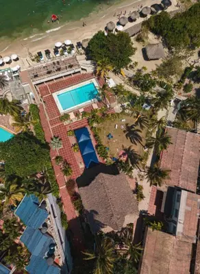 an aerial view of a resort with a swimming pool at Dorado Beach Isla in Playa Punta Arena