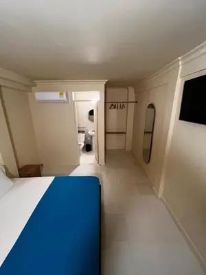 a small room with a bathroom with a toilet at Alma Del Mar in Cartagena de Indias