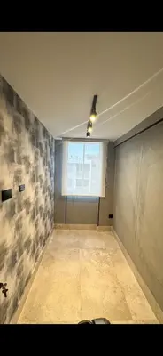 an empty room with a window and a ceiling at Barranquilla Dreams in Puerto Colombia