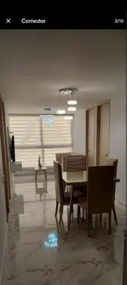 a dining room with a table and chairs at Apartamento, Barranquilla - Miramar in Barranquilla