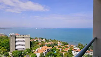 a view of the ocean from a building at Caribbean Refuge - Beach and Pool Access 10th Floor in Santa Marta