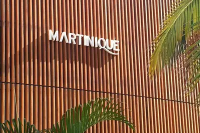 a marmite sign on the side of a building at Modern Apartment Cielo Mar Terrace-Pool-Jacuzzi Close to the beach in Cartagena de Indias
