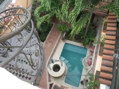 an overhead view of a swimming pool on a balcony at Luxury Colonial Villa Old City Cartagena Rooftop Views Private Pool in Cartagena de Indias