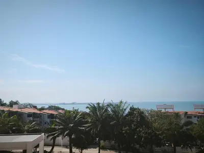a view of the ocean from a resort at Modern suite steps from the sea in Santa Marta