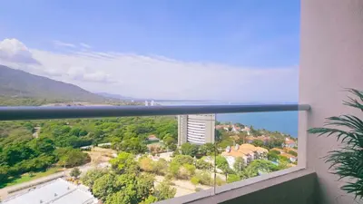 a view of a city from a window of a building at Caribbean Retreat Direct Beach Access in Santa Marta