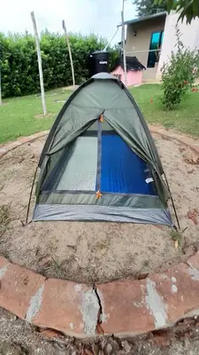a tent on the ground in a yard at Hostal Cultural El Telar in San Jacinto