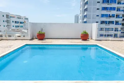 a swimming pool on the roof of a building at Vita 902 Paraíso Costero in Cartagena de Indias