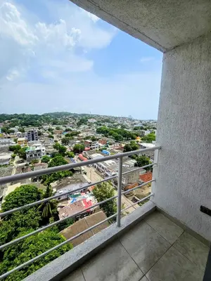 a balcony with a view of a city at Apartamento Moderno 2H cerca Aeropuerto, Playas y Centro Historico in Cartagena de Indias