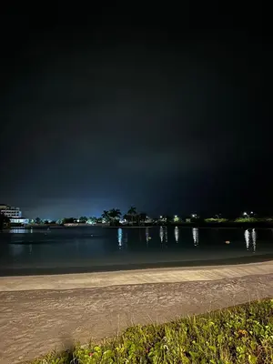 a view of a body of water at night at Baia Kristal Andrés Cartagena in Cartagena de Indias