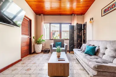 a living room with a couch and a table at Casa Cristi #5 in Cartagena de Indias