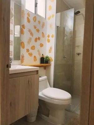 a bathroom with a toilet and a shower at Amazing apartment cerca the beach Manzanillo Sector in Cartagena de Indias