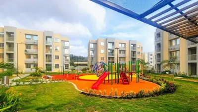 a playground in an apartment complex with a slide at Amazing apartment cerca the beach Manzanillo Sector in Cartagena de Indias