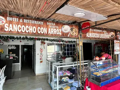 a store with a sign that reads santarococo corn arroyo at Hoteles & Restaurantes Doña Nerta in Cartagena de Indias