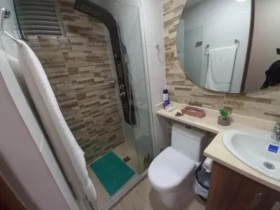a bathroom with a shower and a toilet and a sink at Exclusive Full Apartment in Cartagena in Cartagena de Indias