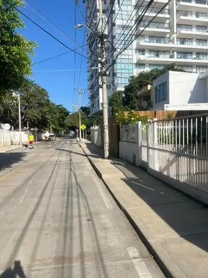 an empty street in a city with a building at Casa Crespo Caribe Cartagena in Cartagena de Indias