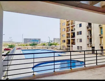 a balcony with a swimming pool in a building at Apartamento en Barranquilla Alameda del Rio in Barranquilla