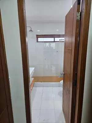 a bathroom with a shower and a toilet at Guest house with AC close to Historical Centre 2 in Cartagena de Indias