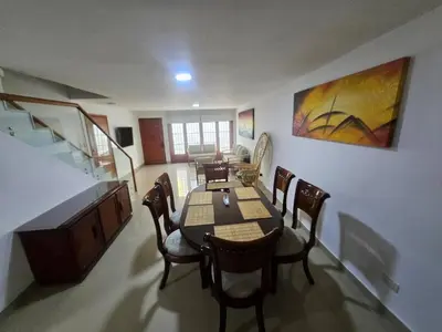 a dining room with a table and chairs at Guest house with AC close to Historical Centre 2 in Cartagena de Indias