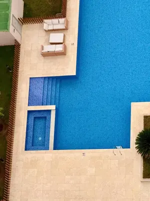 a model of a house with a blue wall at Luxury Apartment betwen Cartagena and Barranquilla in Juan de Acosta