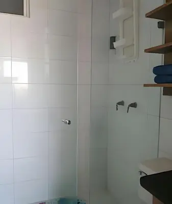 a shower with a glass door in a bathroom at Relax garantizado en Los Morros in Cartagena de Indias