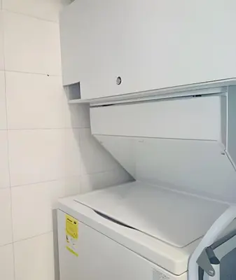 a white refrigerator in a kitchen with white walls at Relax garantizado en Los Morros in Cartagena de Indias