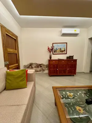 a living room with a couch and a table at Casa Stephanie - Getsemani - Private pool in Cartagena de Indias