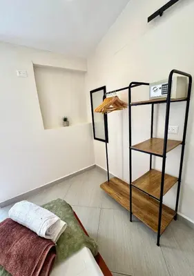 a room with a bunk bed and a shelf at Casa Salvatore - Getsemani - Private pool in Cartagena de Indias