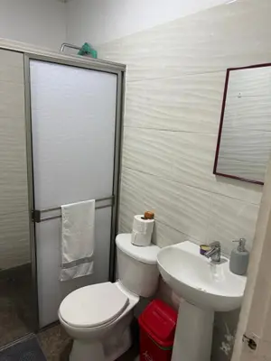 a bathroom with a toilet and a sink at Apartment 402 Tolú 2 habitaciones in Tolú