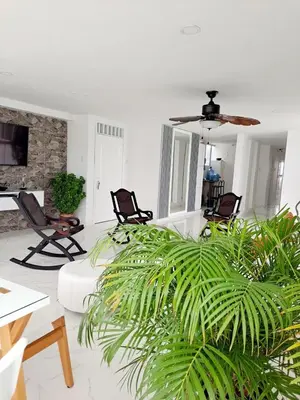 a living room with a couch and chairs at Large and beautiful Oceanfront Penthouse in Cartagena de Indias