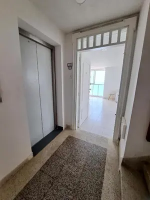 an empty room with an open door and a hallway at Large and beautiful Oceanfront Penthouse in Cartagena de Indias