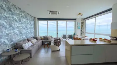 a living room with a couch and a table at Magico Apartamento Frente al Mar 4 Habitaciones CB72 in Estación El Salto