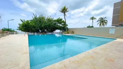 a large swimming pool with blue water at Magico Apartamento Frente al Mar 4 Habitaciones CB72 in Estación El Salto