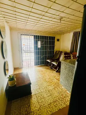 a living room with a couch and a table at Lilis house in Cartagena de Indias