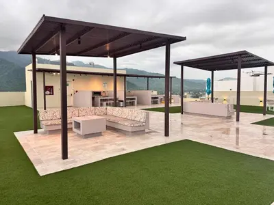 a rendering of a pavilion with seating and grass at Santa marta bello horizonte Swift Lotf in Playa Bello Horizonte