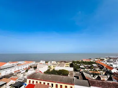 an aerial view of a city with the ocean at Casa Manalva ocean view penthouse in walled city in Cartagena de Indias