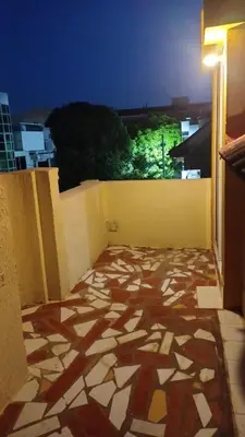 a room with a stone floor on the side of a building at Modern duplex 5 minutes from the Historic Center in Cartagena de Indias