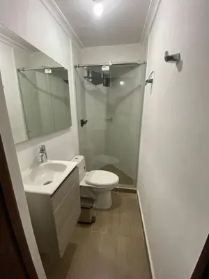 a bathroom with a shower and a toilet and a sink at Modern duplex 5 minutes from the Historic Center in Cartagena de Indias