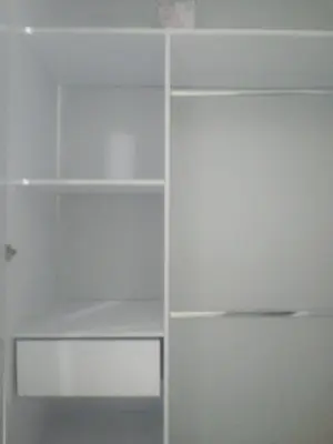 a white closet with white shelves in a room at Rey SALOMÓN SALJA in Barranquilla