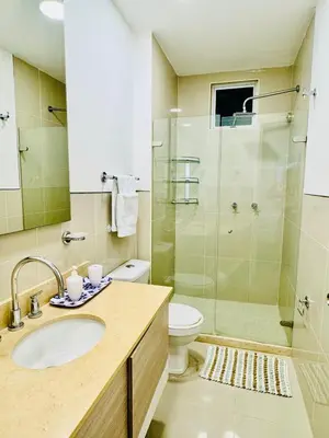 a bathroom with a sink and a toilet and a shower at Apartamento en Cartagena con balcón en Morros in Cartagena de Indias
