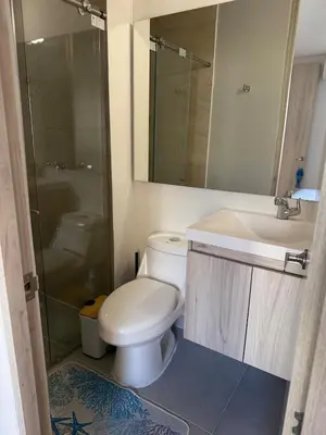 a bathroom with a toilet and a sink at Beach house in Cartagena de Indias
