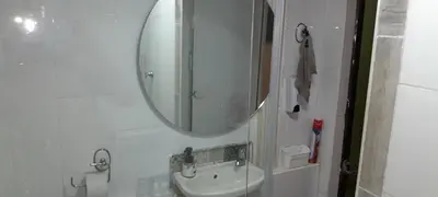 a bathroom with a sink and a mirror at apartamento 3 habitaciones totalmente equipado in Cartagena de Indias