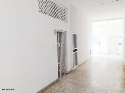 an empty room with white walls and a hallway with doors at apto en casa centro historico 3 piso in Cartagena de Indias