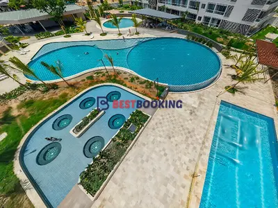 an overhead view of two swimming pools at a resort at Santa Marina Luxury Stay - Ocean View in Estación El Salto